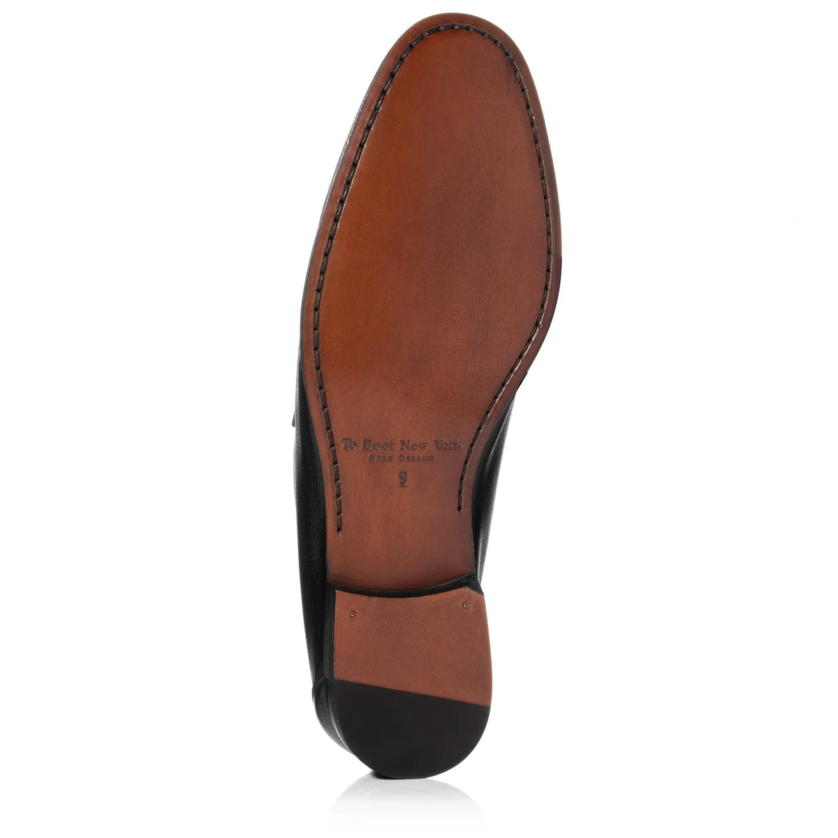 black dress shoe with brown sole To Boot New York Ravello Penny Loafers